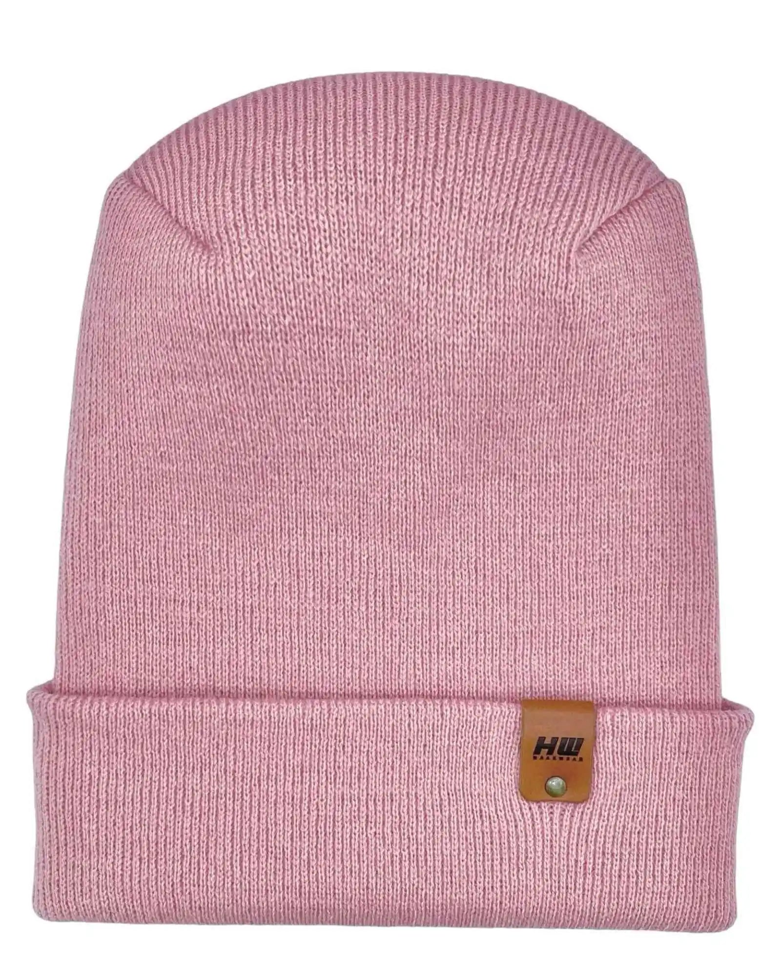 Light pink ribbed knit beanie with folded cuff and small brown logo patch.