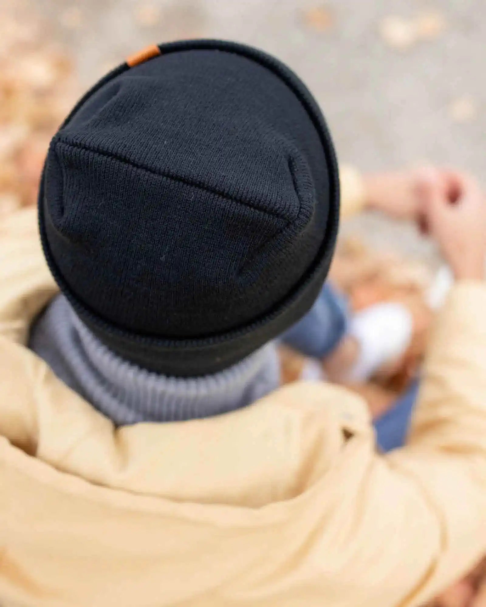 Charcoal black cuffed beanie, folded ribbed hem and smooth knit crown