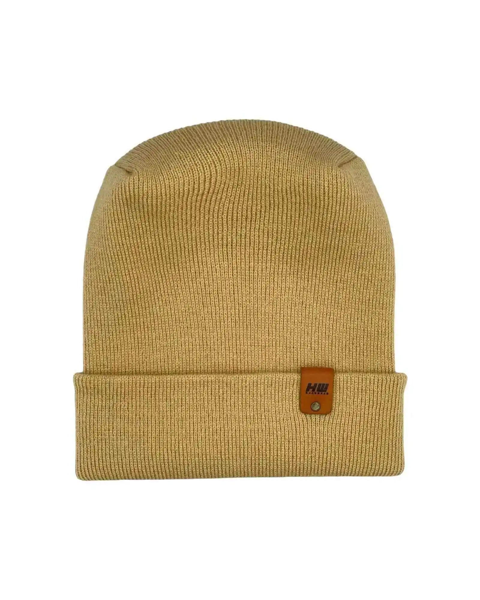 Cuffed knit beanie in dune beige with leather logo patch