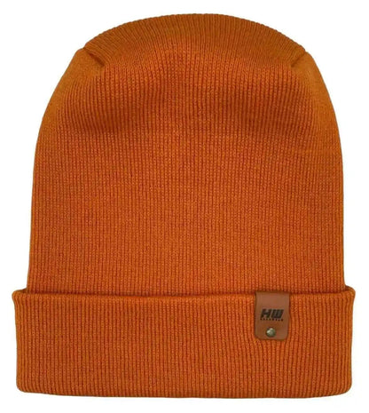 Tiger orange knit cuffed beanie with folded brim and small logo patch