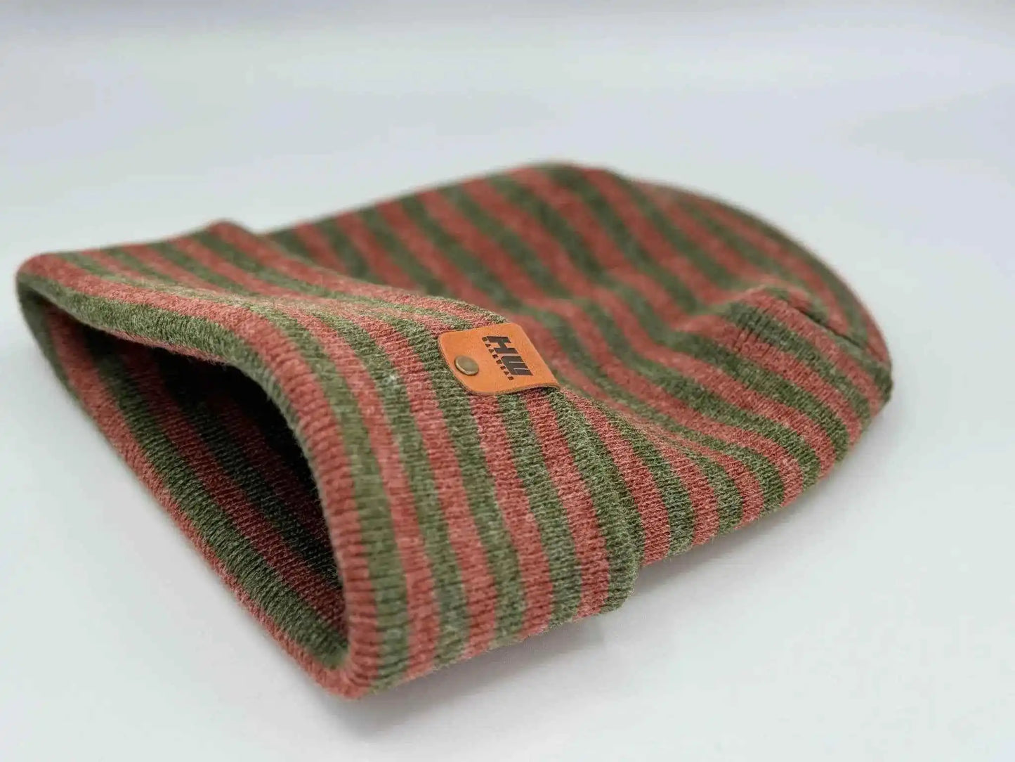 Folded cuff striped knit beanie, burgundy and green with orange brand tag