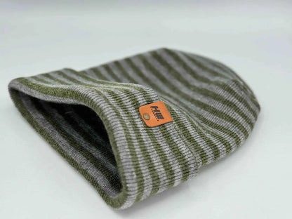 Gray and green striped cuffed beanie, rolled edge opening with orange logo patch