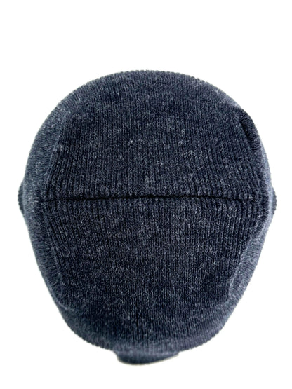 Denim blue knit beanie with ribbed crown and un-cuffed rolled edge.