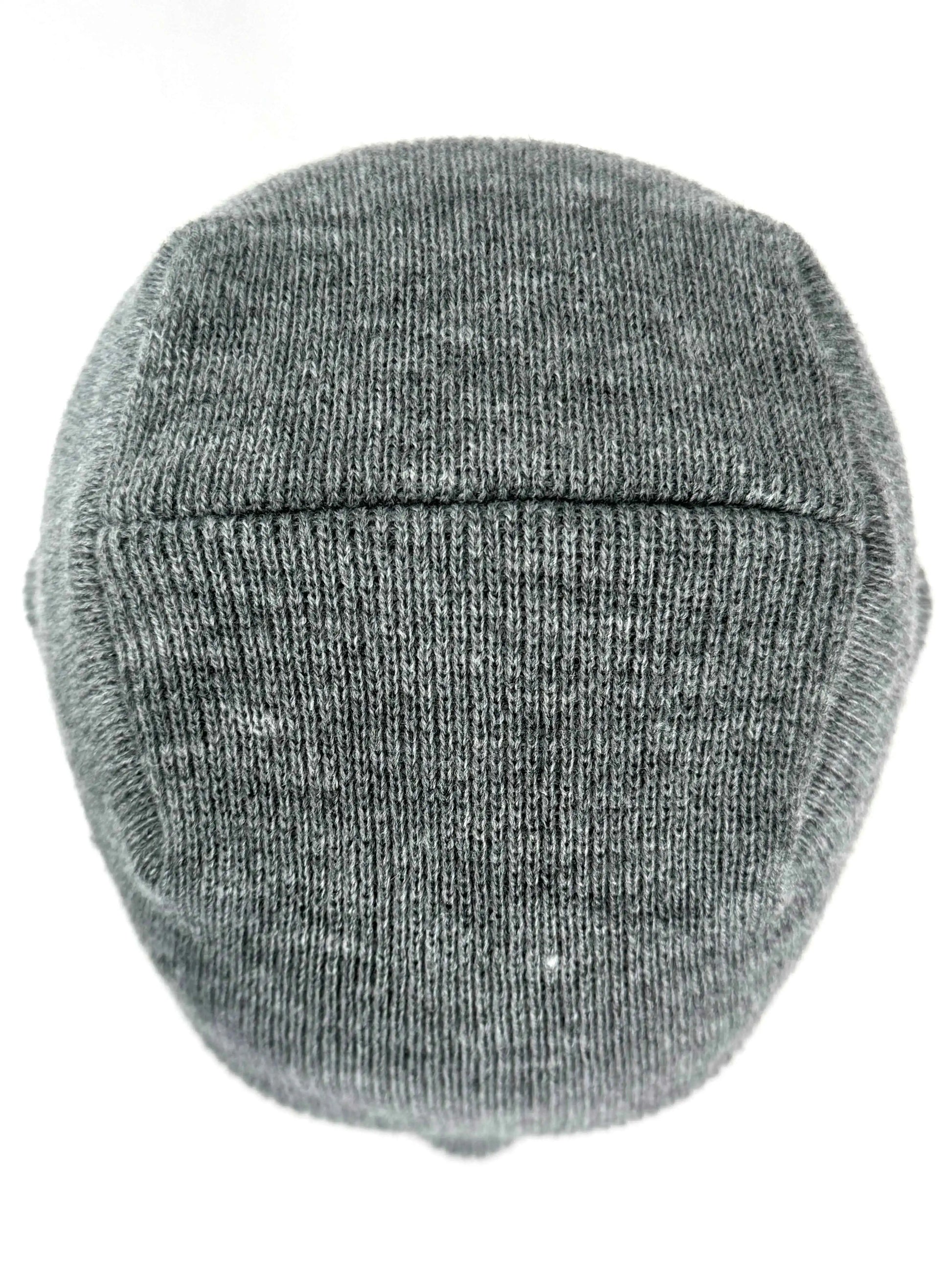 Light gray knit beanie with ribbed texture and uncuffed seam band