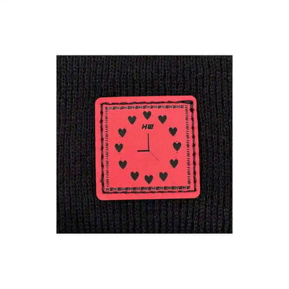 Black beanie knit texture with rectangular pink heart clock graphic patch