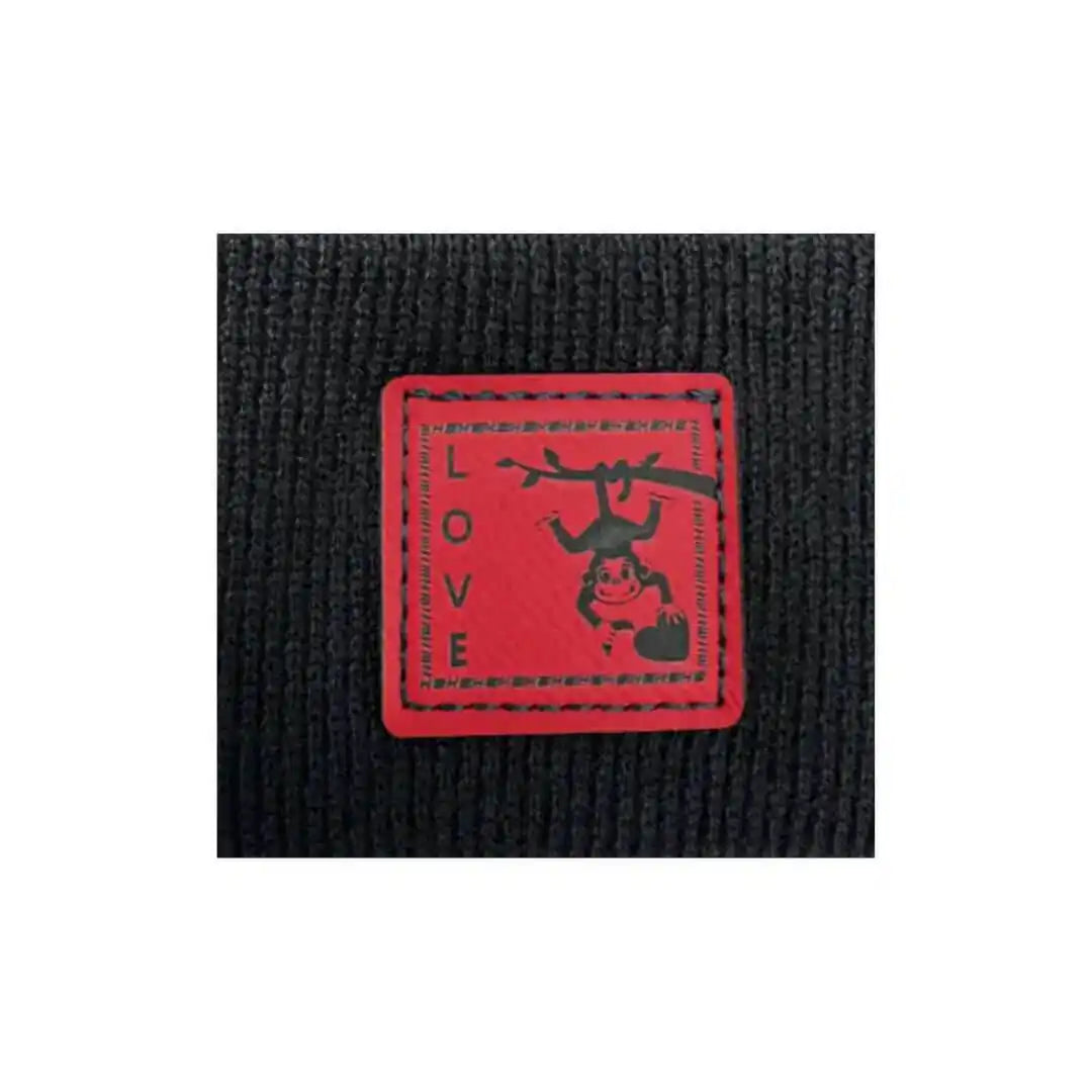 Black knit beanie cuff close-up with red square love monkey patch