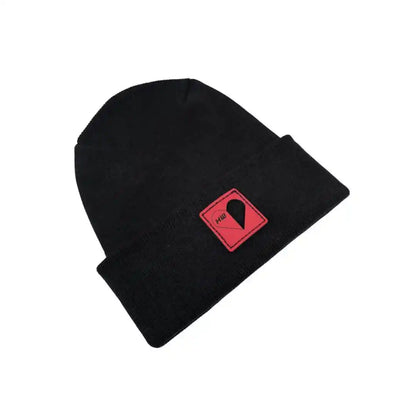 Black knit beanie turned up cuff with red logo patch