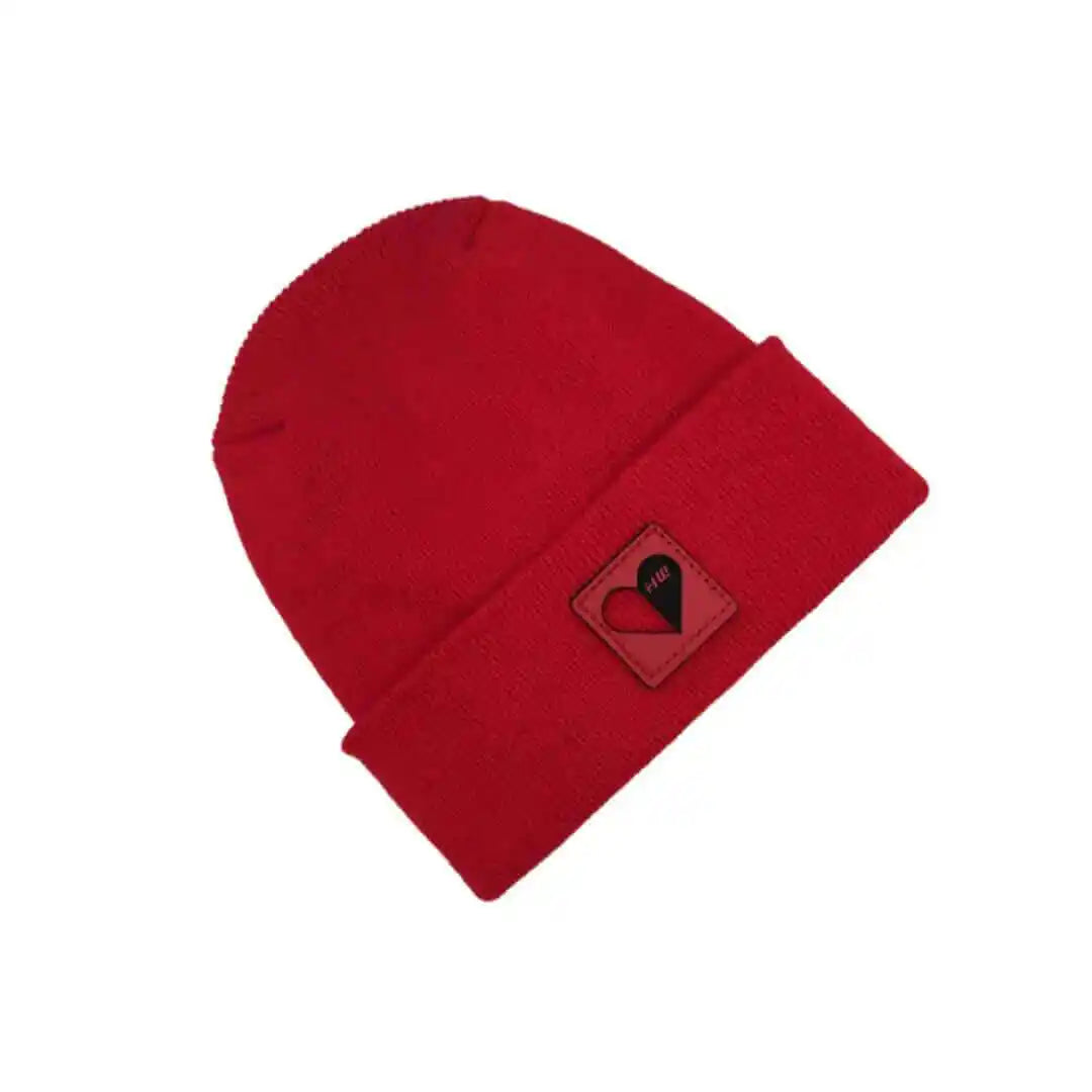 Scarlet red beanie with heart logo patch, folded cuff