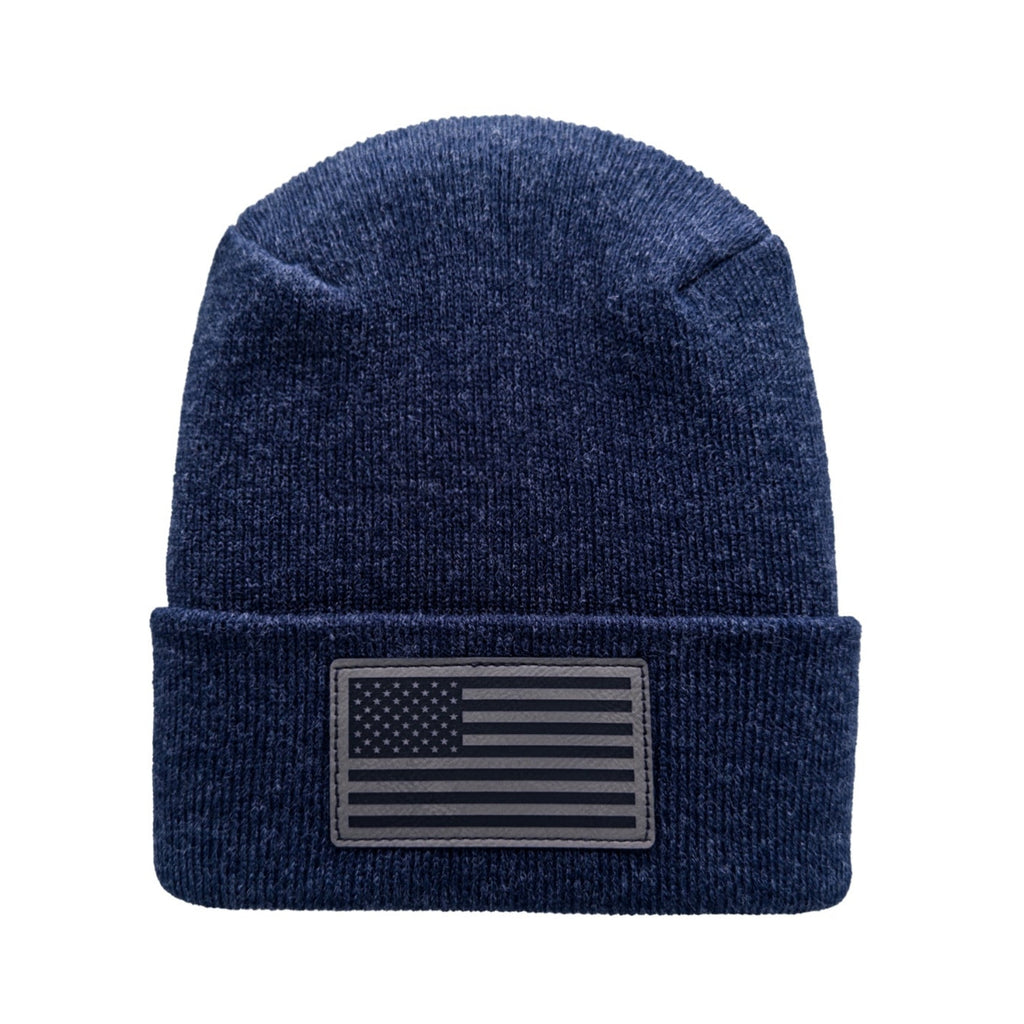 Blue beanie with an American flag patch on a white background